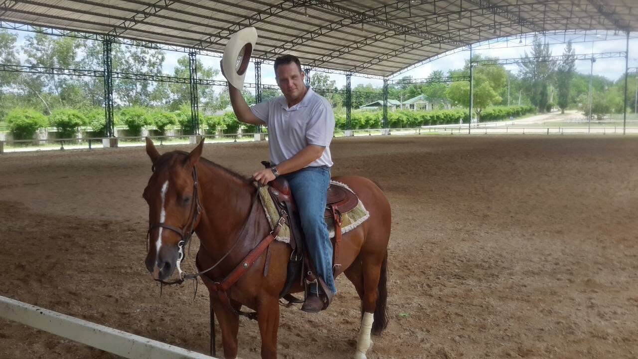 Ben Cunningham on horseback
